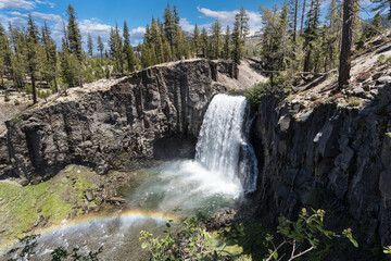 View of Rainbow Falls with rainbow near Devils Postpile and Mammoth Lakes in the California Sierra...