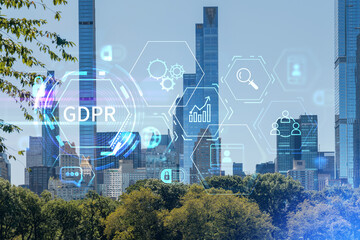 Green lawn at Central Park and Midtown Manhattan skyline skyscrapers at day time, New York City, USA. GDPR hologram, concept of data protection, regulation and privacy for all individuals