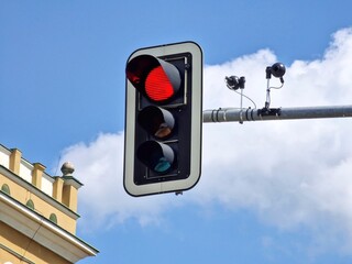 Traffic lights with a CCTV cameras controling the vehicle speed