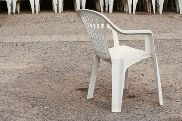 single white garden chair in summer