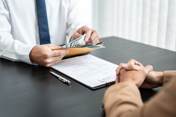 Bribe employer is offer terms to the businessman for signing on contract while making corruption...