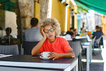 drinks and people concept - woman with cup drinking cafe at city street cafe terrace