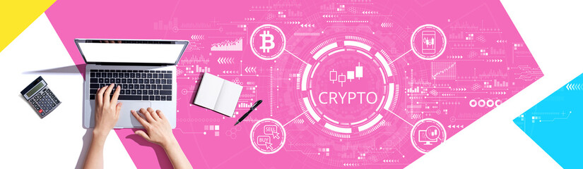 Obraz na płótnie Canvas Crypto Trading theme with person using a laptop computer