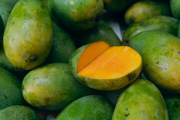 Mango, a green beautiful tropical fruit at a Asian supermarket.