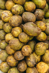 Mango, a green beautiful tropical fruit at a Asian supermarket.