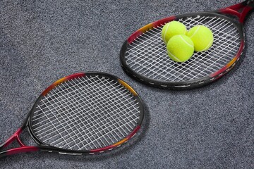 Pickleball Paddle and ball of court background.