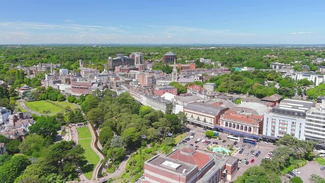 Bournemouth, UK: Aerial view of city in England, wide beach, blue waters of Atlantic Ocean in seaside resort in summer, sunny day with clear blue sky - landscape panorama of United Kingdom from above