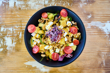 vegan salad with fresh cheese, corn and vegetables