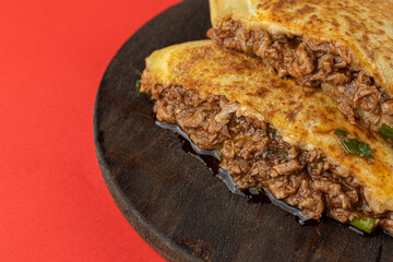 Swiss Crepe Stuffed with Pulled Pork Ribs with Salad and Tomato Sauce