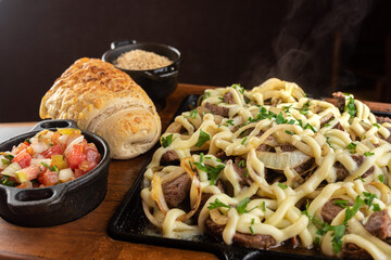 Appetizer - Portion of filet mignon with cream cheese