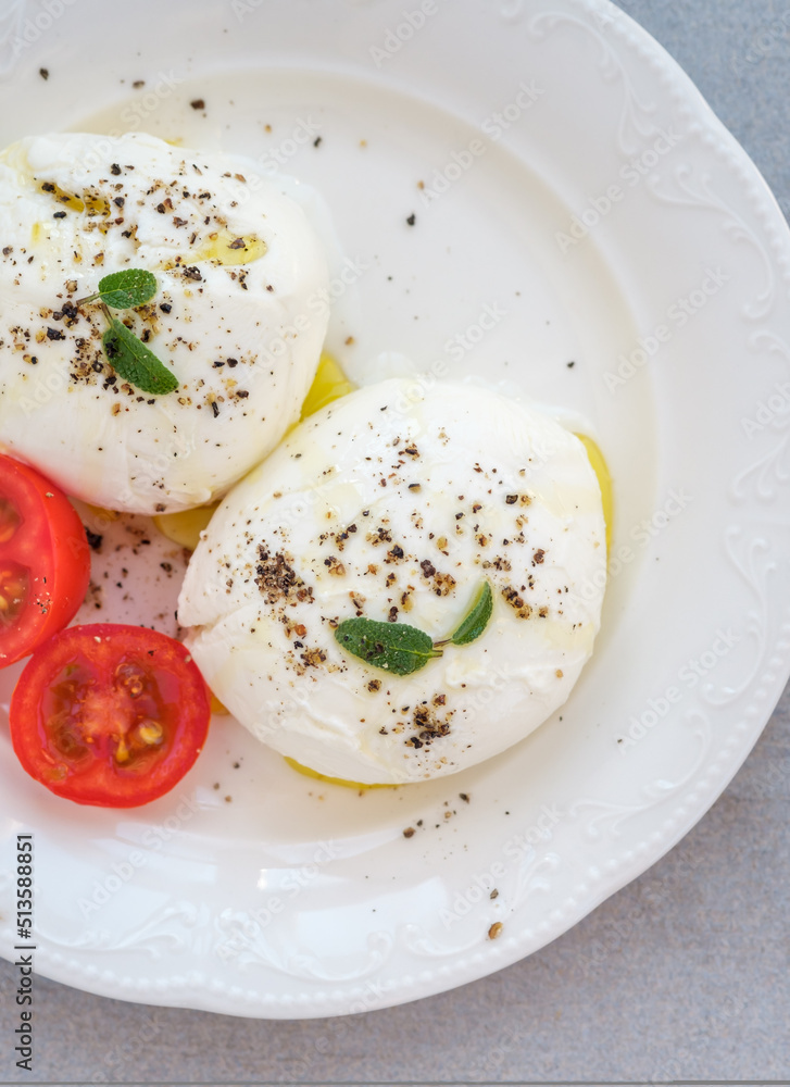 Wall mural Mozzarella cheese on the plate