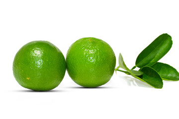 Fresh green lime (lemon) fruit isolated on white background