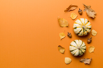 Autumn composition. Pattern made of dried leaves and other design accessories on table. Flat lay, top view