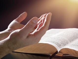 Man hands praying to god with the bible. Believe in goodness. Holding hands in prayer. Power of hope or love and devotion.