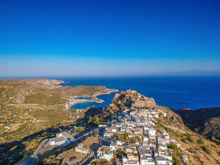 Breathtaking aerial panoramic view over Chora, Kythera by the Castle at sunset. Majestic scenery over Kythera island in Greece, Europe