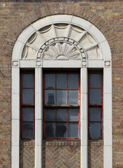 Detail of Art Deco window of a building in the historic city center of London.
England. United Kingdom.