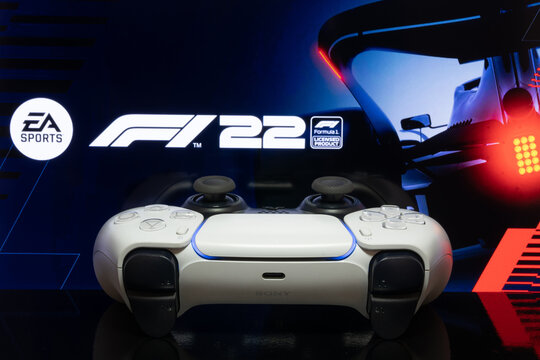 Playstation 5 controller with F1 22 logo at TV screen, selective focus, 27 Jun, 2022, Sao Paulo, Brazil.