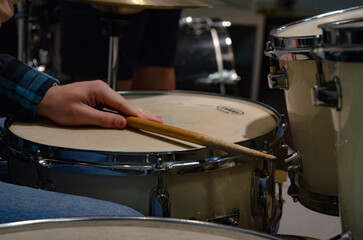 hands playing drums