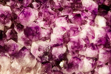 Background texture of purple amethyst gemstone