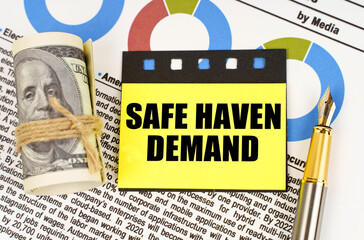 On documents with diagrams there are dollars, a pen and yellow stickers with the inscription - SAFE...