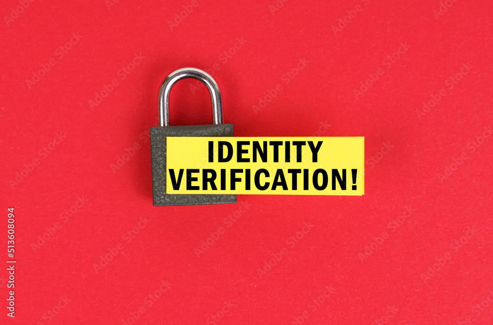 Aufkleber on the red surface there is a lock with a sticker with the inscription - identity verification
