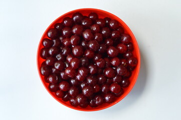 A pile of freshly picked sour cherries