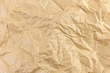 Crumpled brown craft paper texture, rustic recycle material