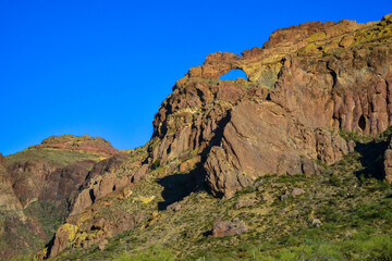 Fototapeta na wymiar Arch in the Mountain at Organ Piper Cactus National Park in Arizona