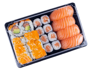 Sushi delivery box isolated on white. Japanese set menu in black transparent box. Top view