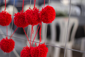 red buboes from threads. Holiday Spain Hogueras