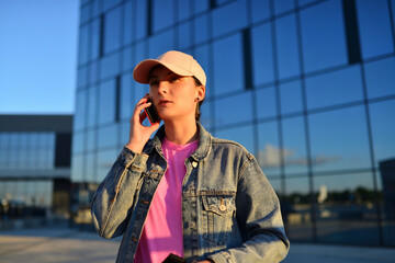 business, communication, technology and people concept - businesswoman calling on smartphone in city - 513614230