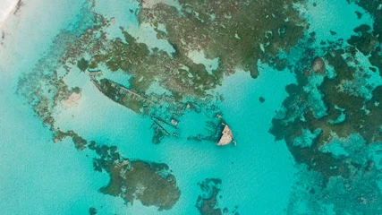 Fototapeten aerial view of the ship wreck in the indian ocean in dar es salaam, Tanzania © STORYTELLER
