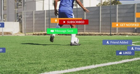 Social media concept icons against african american male soccer player practicing on sports field - Powered by Adobe