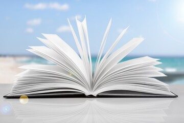 Pages of an open book. The concept of continuing education, visiting libraries, book exhibitions.