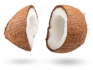Ripe coconut broken into two halves closeup isolated on white background