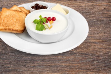 Oatmeal bowl. Oat porridge with fruits and milk for healthy breakfast or lunch. Healthy food, diet.