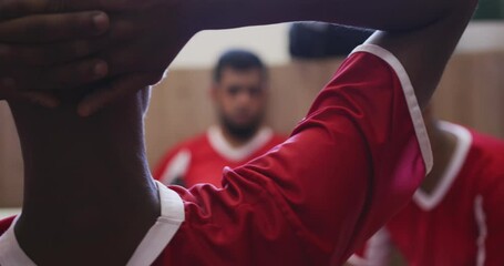 Animation of diverse male soccer players in changing room - Powered by Adobe