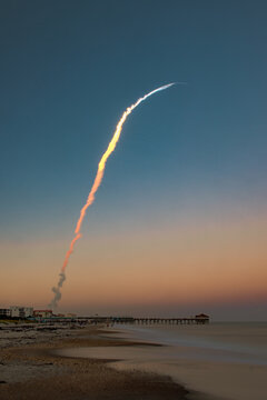 An Atlas V rocket launch from Kennedy Space Center viewed from Cocoa Beach, Florida
