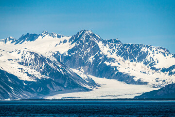 Fototapeta na wymiar Wide view of the Bear Glacier entering Resurrection Bay near Seward Alaska