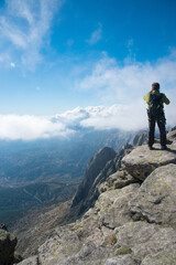 Obraz premium Beautiful aerial landscape from Gredos. Man at the top of the hill, seen from his back