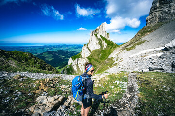 Hiker resting on trail with a beautiful panorama