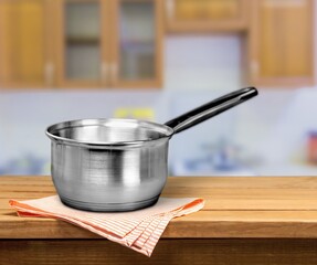 Classic frying pan with a non-stick coating on the desk