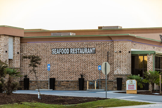 Pooler, USA - October 19, 2021: Pooler, Georgia near Savannah with sign for Seafood restaurant called 201 Seafood Restaurant & Tapas Lounge