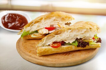 Tasty sandwich with vegetables, ham and cheese, traditional restaurant menu dish, food cooking recipe book cover.