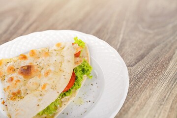 Tasty sandwich with vegetables, ham and cheese, traditional restaurant menu dish, food cooking recipe book cover.