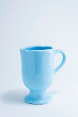 ceramic cups and bowls of various colors and modern deco designs for different infusions and foods