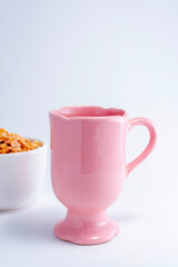 ceramic cups and bowls of various colors and modern deco designs for different infusions and foods