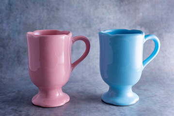 ceramic cups and bowls of various colors and modern deco designs for different infusions and foods