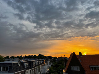 Picturesque view of city street with beautiful buildings at sunrise