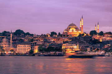 Fototapeta na wymiar Old town at sunset - Fatih district and The Suleymaniye Mosque, Istanbul, Turkey